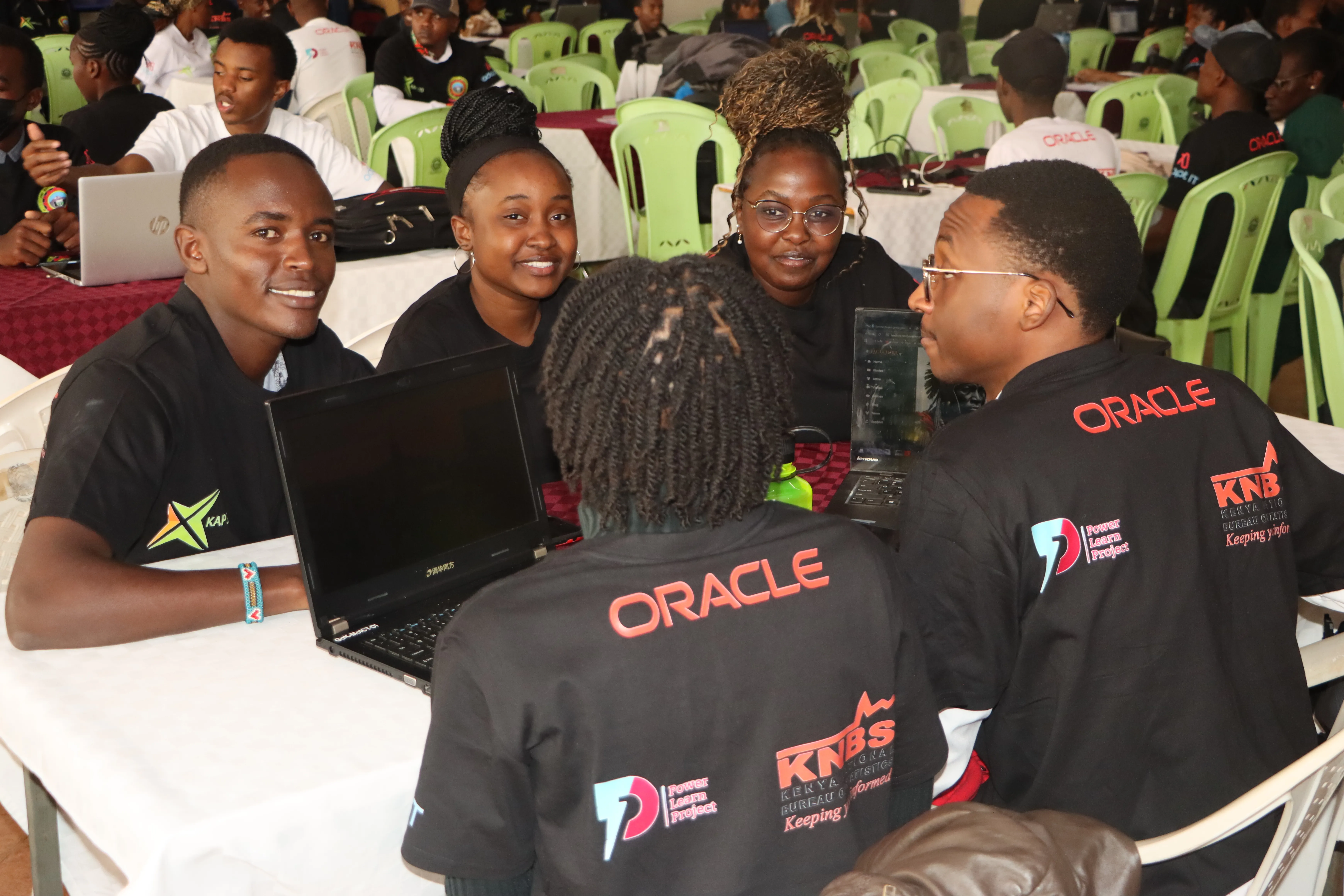 Students collaborating at the Inter-University Hackathon